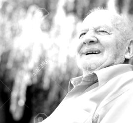 25414585-closeup-profile-on-a-smiling-old-man-blackwhite